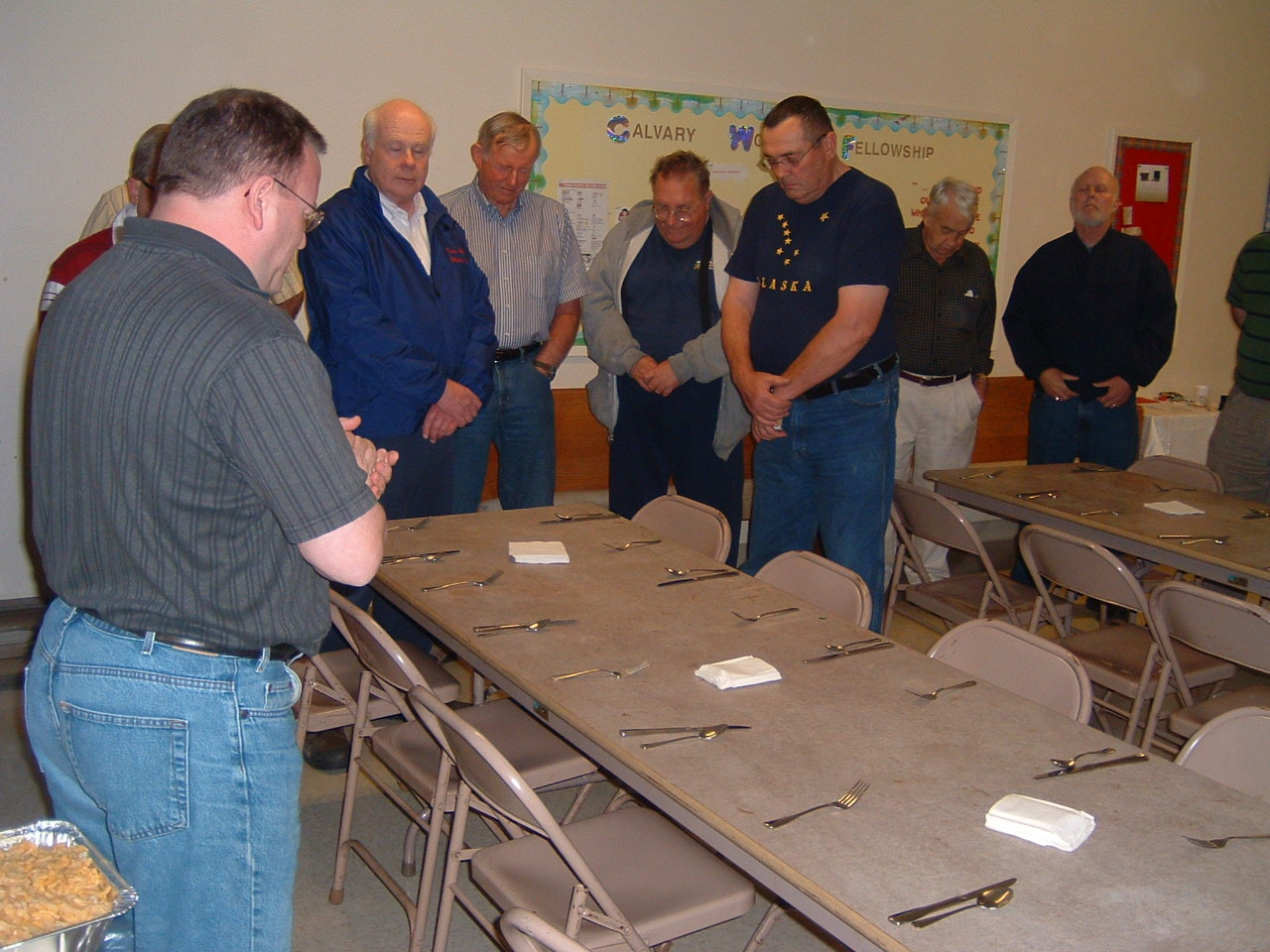 men praying